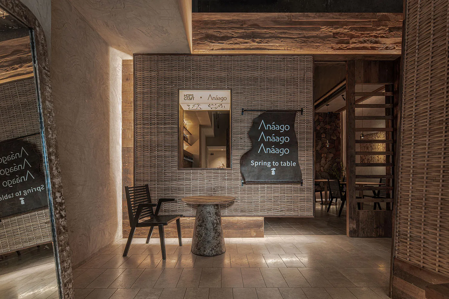 A modern showroom with a large wooden table and chairs, surrounded by clean and organized space to showcase furniture and items for sale