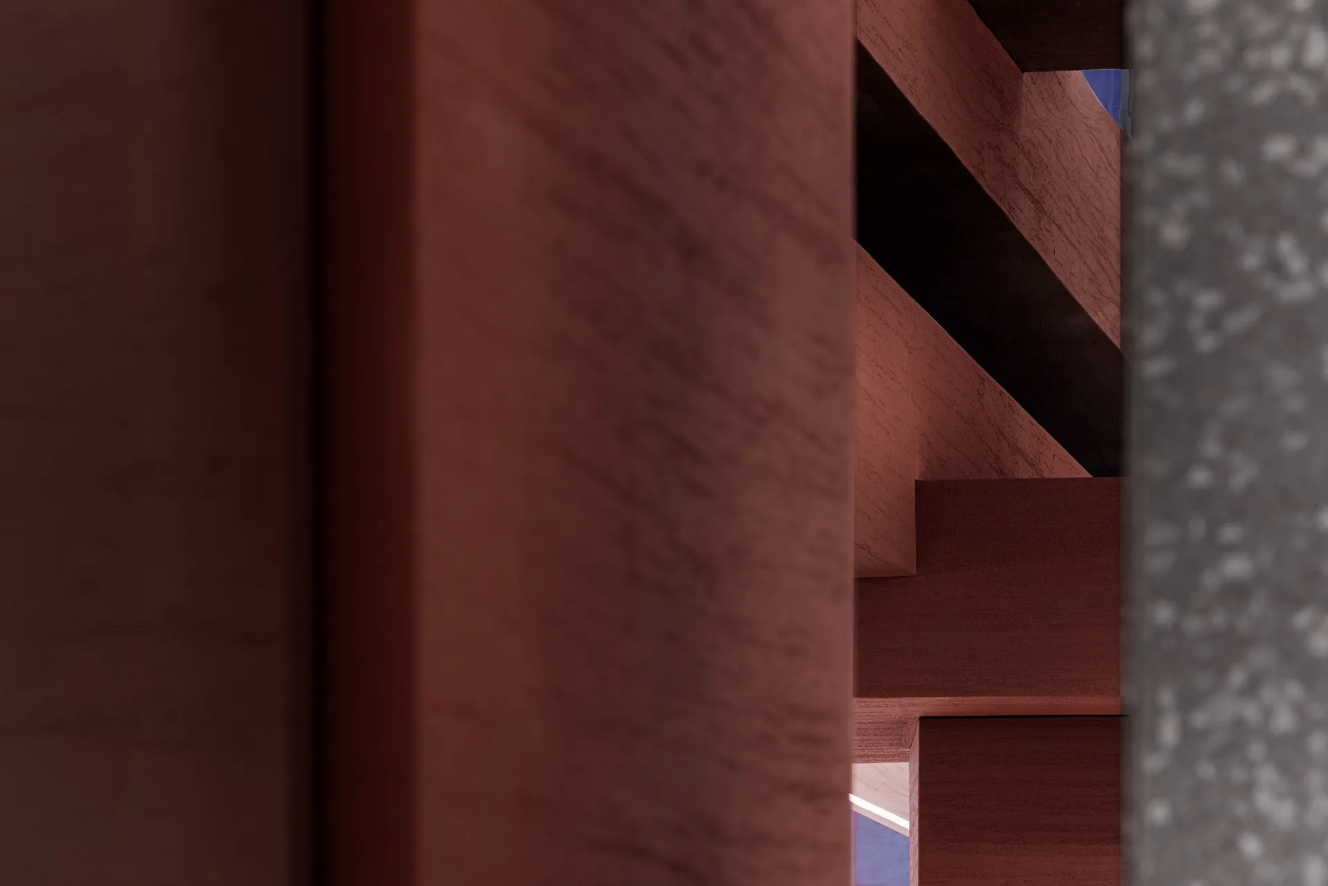 A wooden staircase in front of a stone wall, creating a sense of depth and dimension