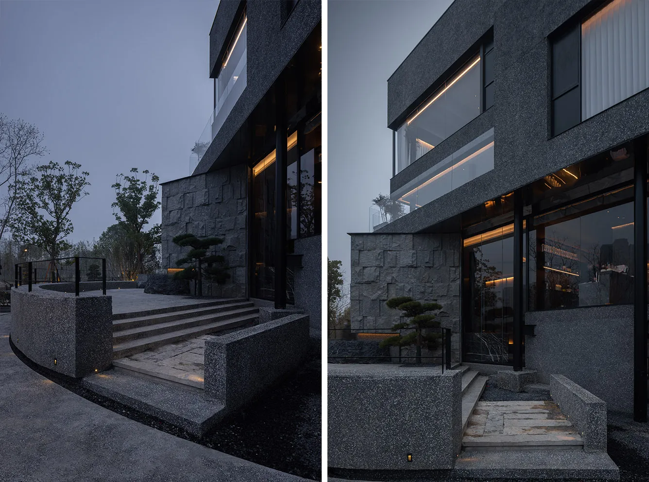 夜晚建築外牆立面，具備混凝土牆面、階梯與樓梯，襯托於深色背景