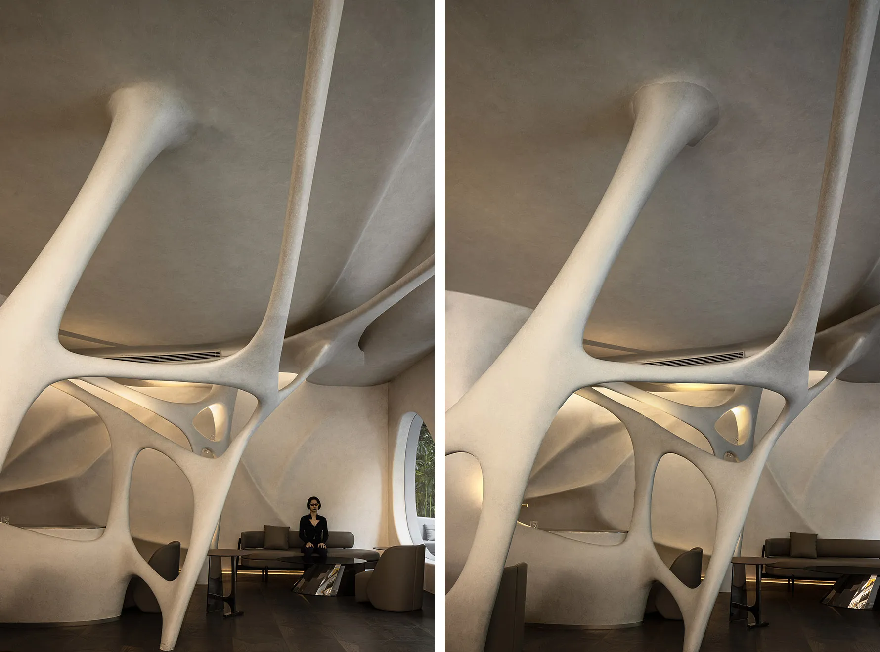 A modern lobby with a large white concrete structure, chairs, a dining table, and a couch, creating a comfortable and inviting atmosphere for social interaction and relaxation