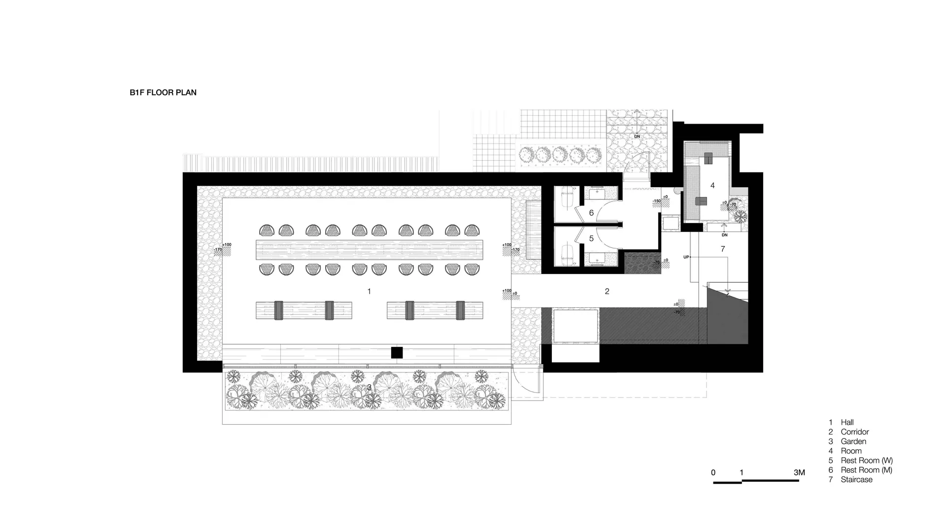 Large interior space with multiple dining tables and chairs, featuring a functional layout for gatherings and events