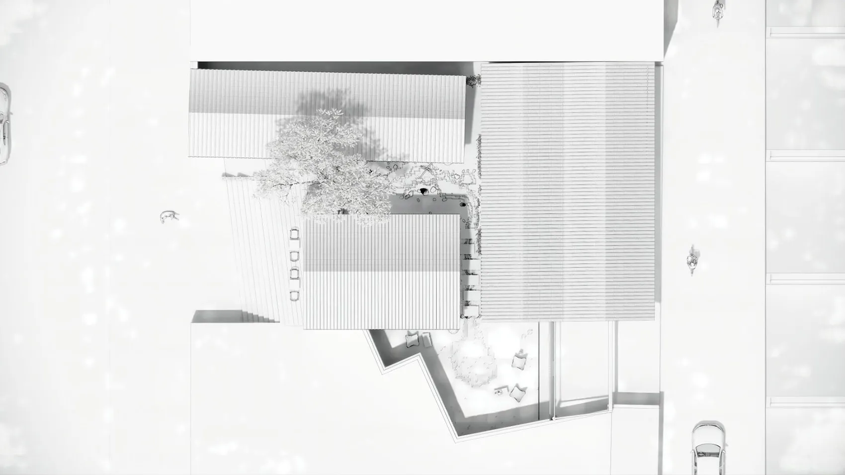 寧靜而吸引人的公共空間，現代建築擁有大片窗戶、前方有樹木及散置座椅