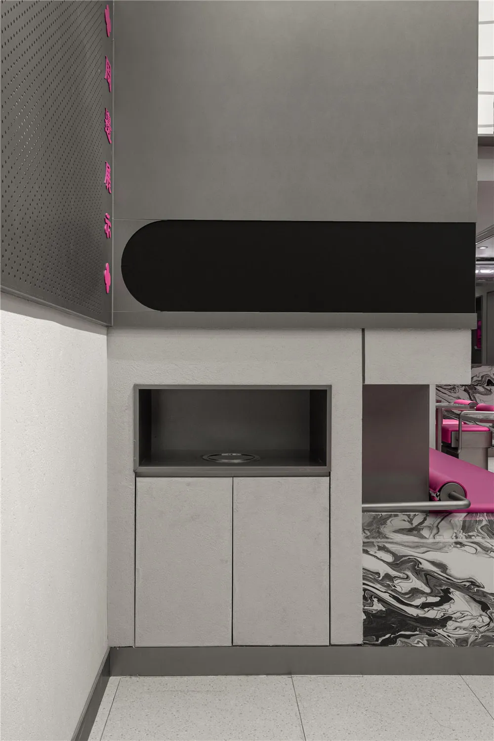 Modern bathroom with dual sinks, a countertop, and a cabinet, featuring a focus on practicality and cleanliness