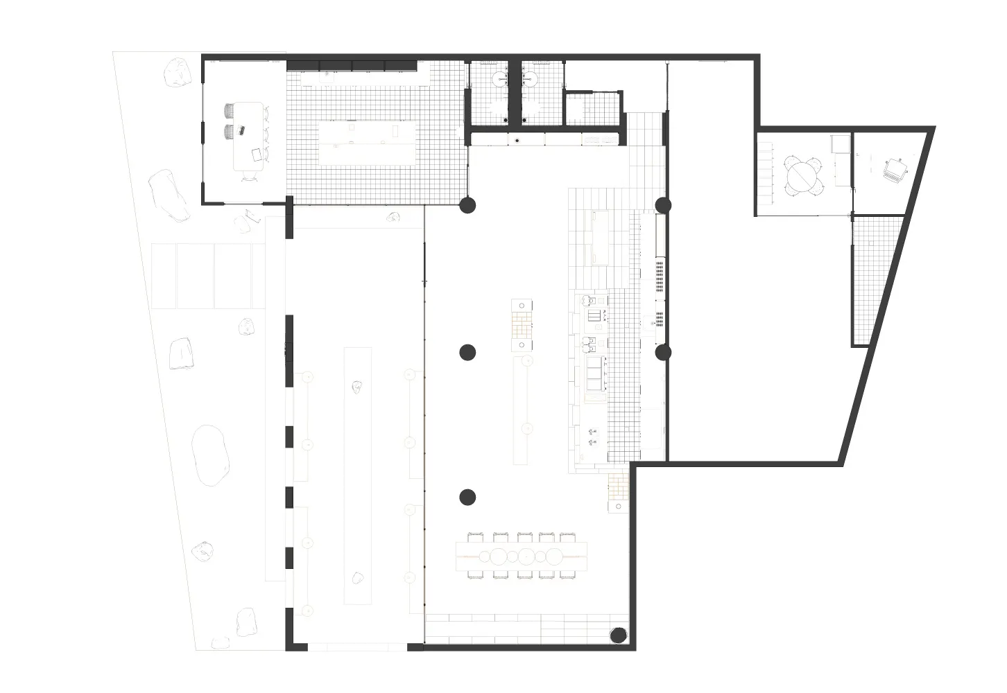 A large empty interior space with white walls, multiple rooms, and no furniture or decorations