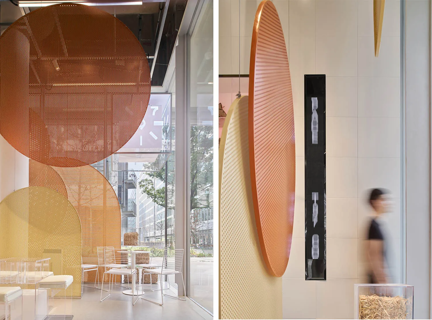 A restaurant with comfortable seating, large windows, and artwork on the walls, creating a welcoming atmosphere