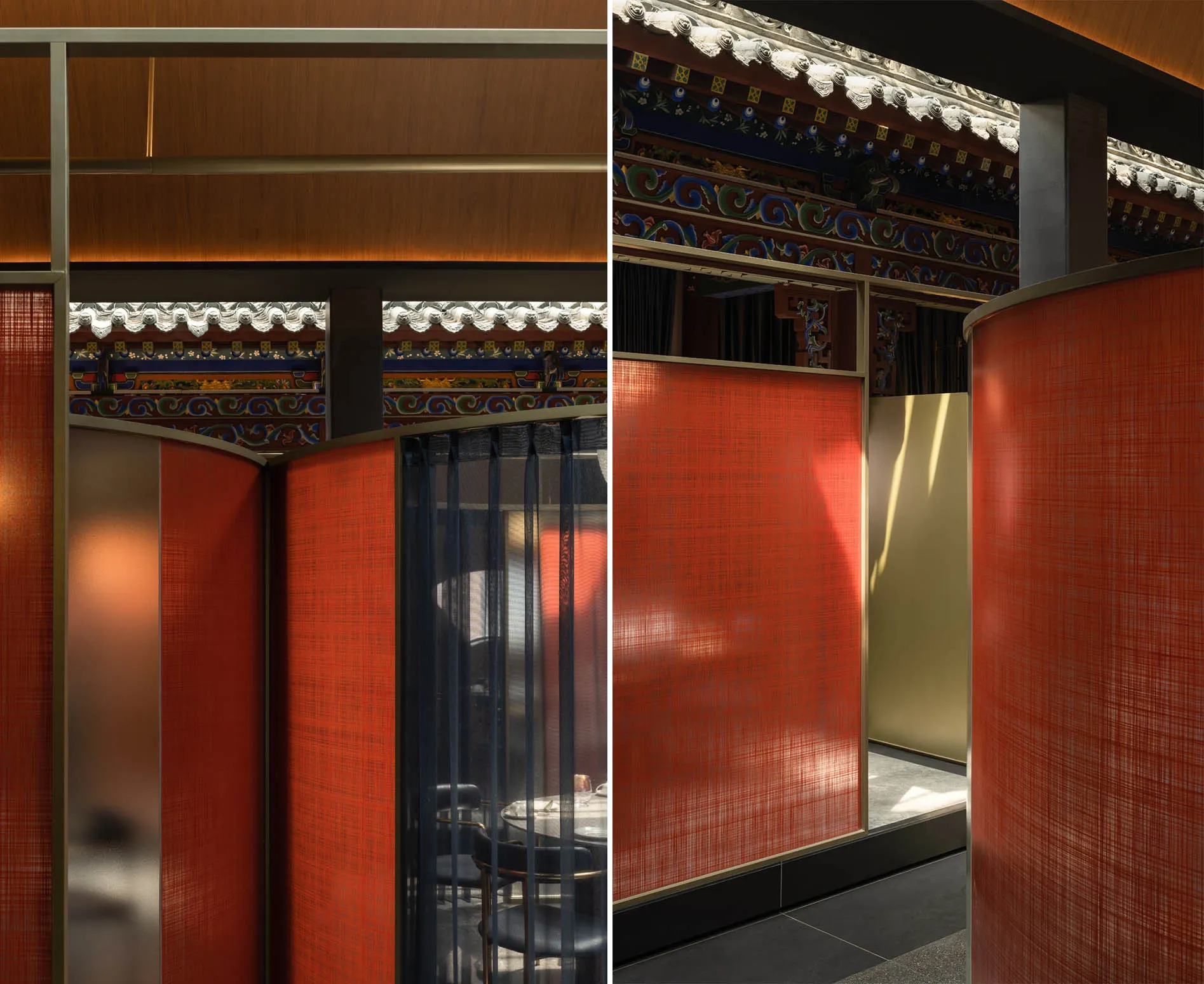 Dining area with tables and chairs in an Asian restaurant featuring red and gold walls, orange curtains, and decorative vases