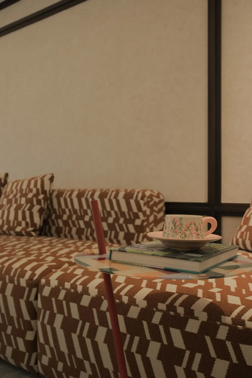A cozy living space with two couches, chairs, and a coffee table, featuring a pink cup and white walls, creating a clean and inviting atmosphere