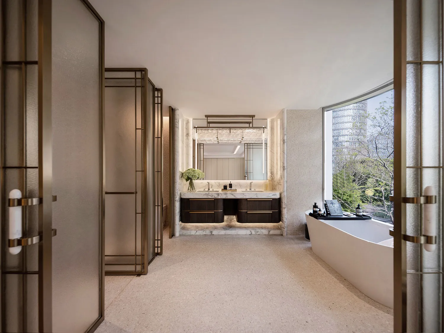Modern bathroom with two sinks, a large white bathtub, and marble walls, giving a clean and minimalist appearance