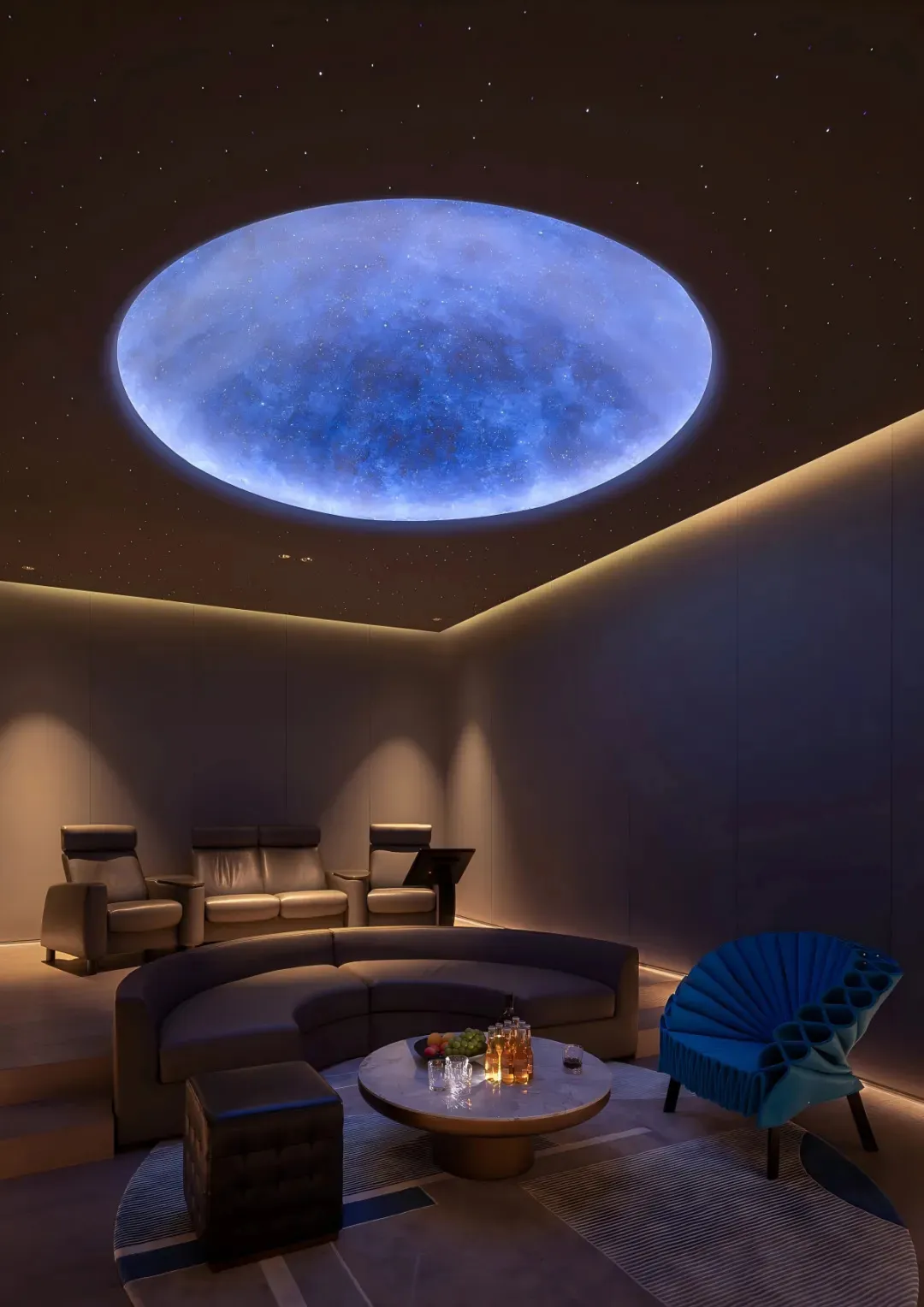 A modern living area with a round window in the ceiling, two couches, a chair, and a comfortable seating arrangement