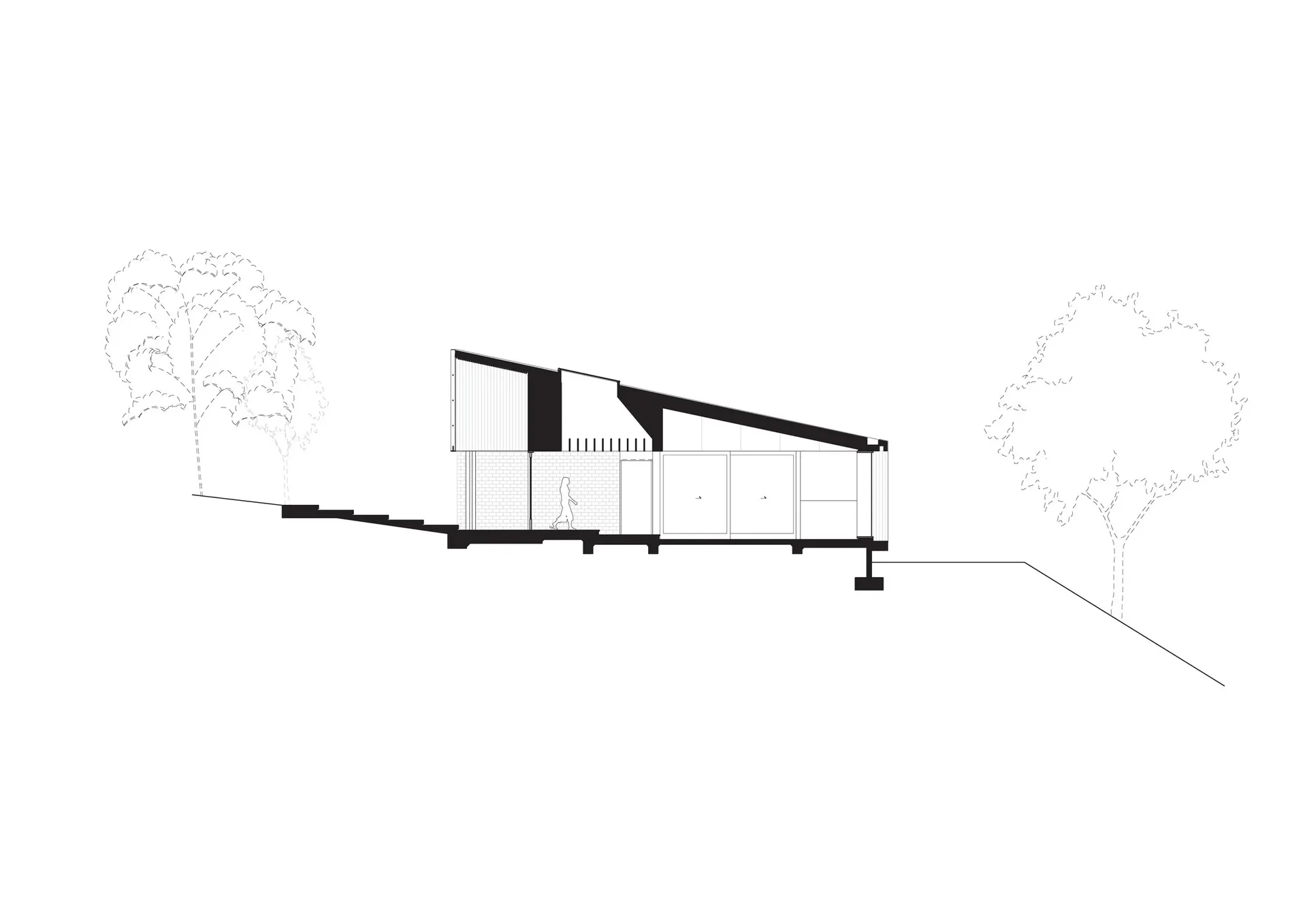 A modern house on a hillside with large windows, natural light, and two people in the scene, creating a comfortable and inviting living environment