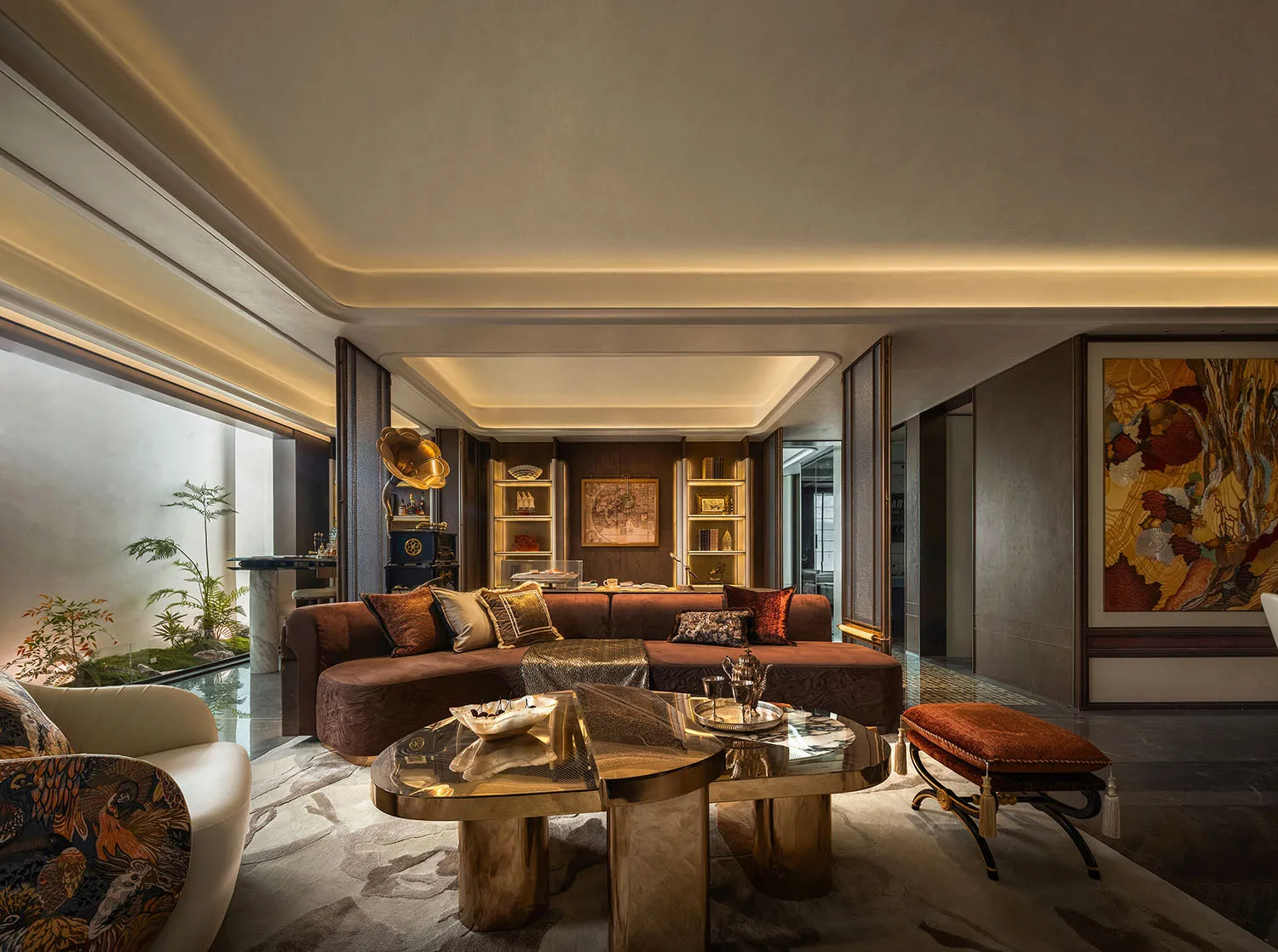 Cozy living space with a brown leather sofa, two chairs, and a dining table, designed for relaxation and socializing