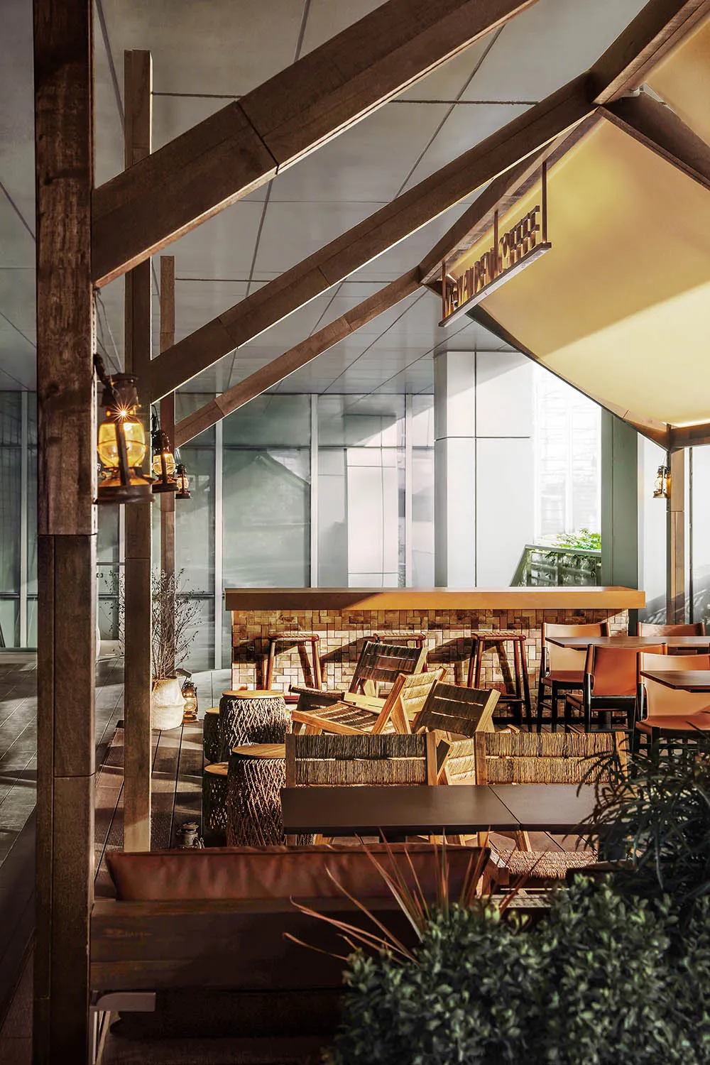 A modern outdoor restaurant with a patio area filled with tables and chairs, featuring wood and metal materials and natural sunlight