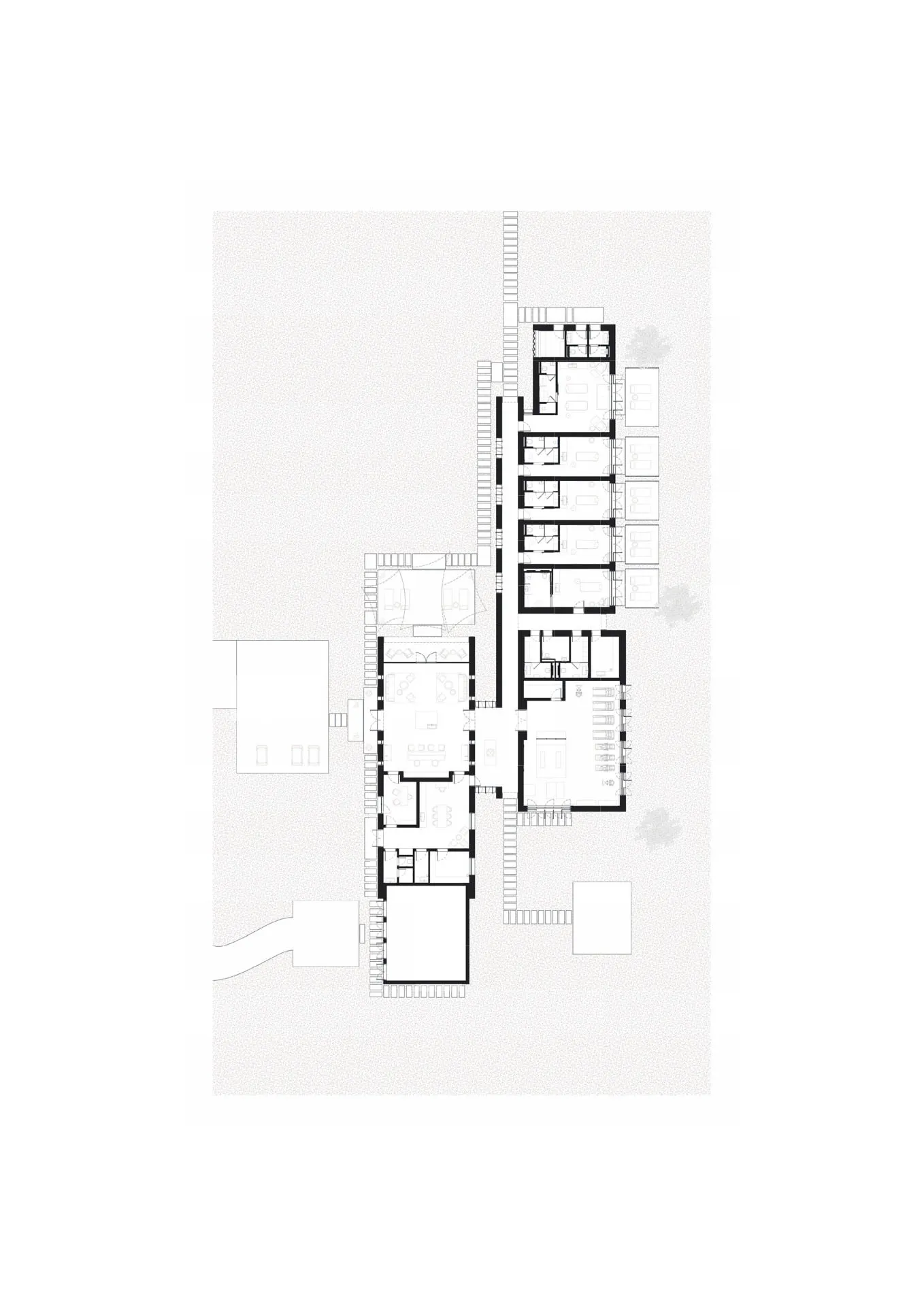 A simple hand-drawn floor plan of a hotel or apartment complex with a mix of open and enclosed areas, featuring a calm and organized design