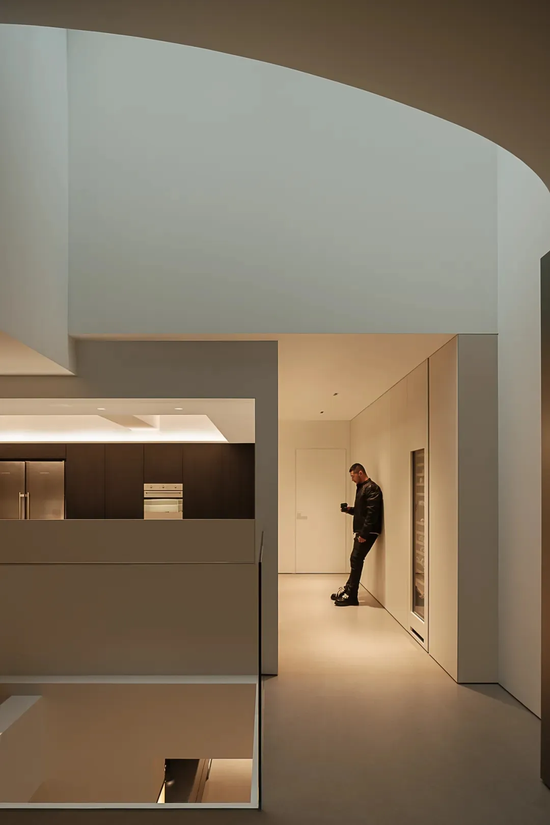 A bright and inviting kitchen with a refrigerator, oven, and sink, illuminated by natural light