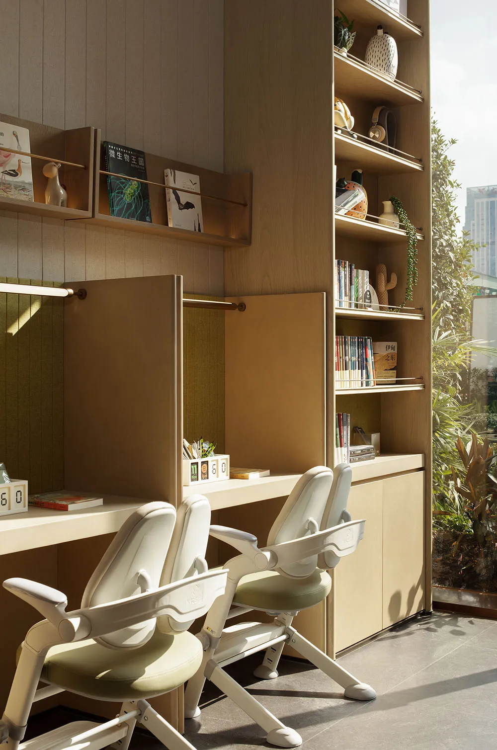 A home office with a wooden desk and two white chairs, surrounded by natural light from a window, creating a cozy and inviting atmosphere
