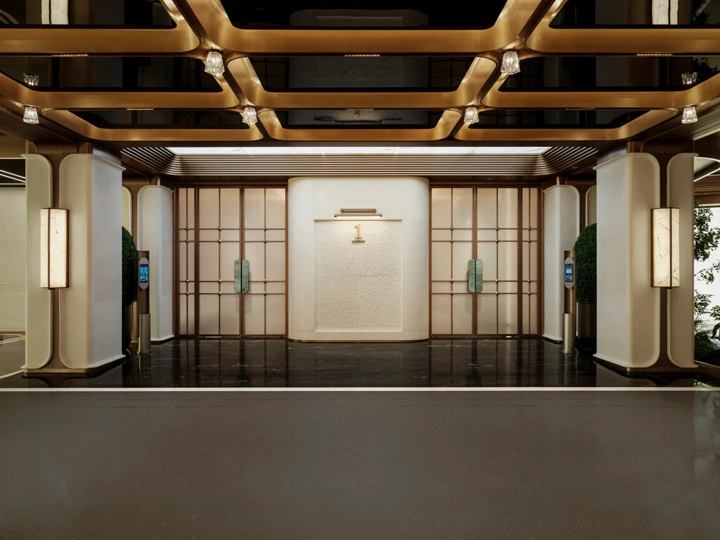 Bright and welcoming lobby with a large white wall, gold trim, and decorative elements, illuminated by natural light