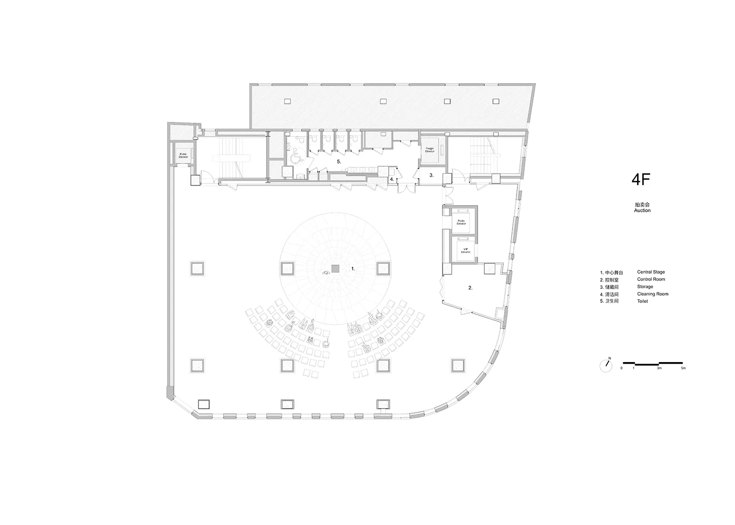 Large modern auditorium with multiple seating areas, a stage, and well-lit interior