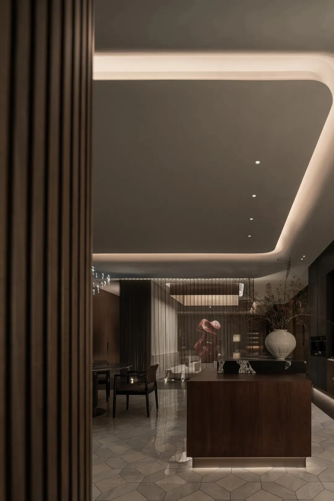 Warm and inviting living space with a wooden theme, natural light, and comfortable furniture