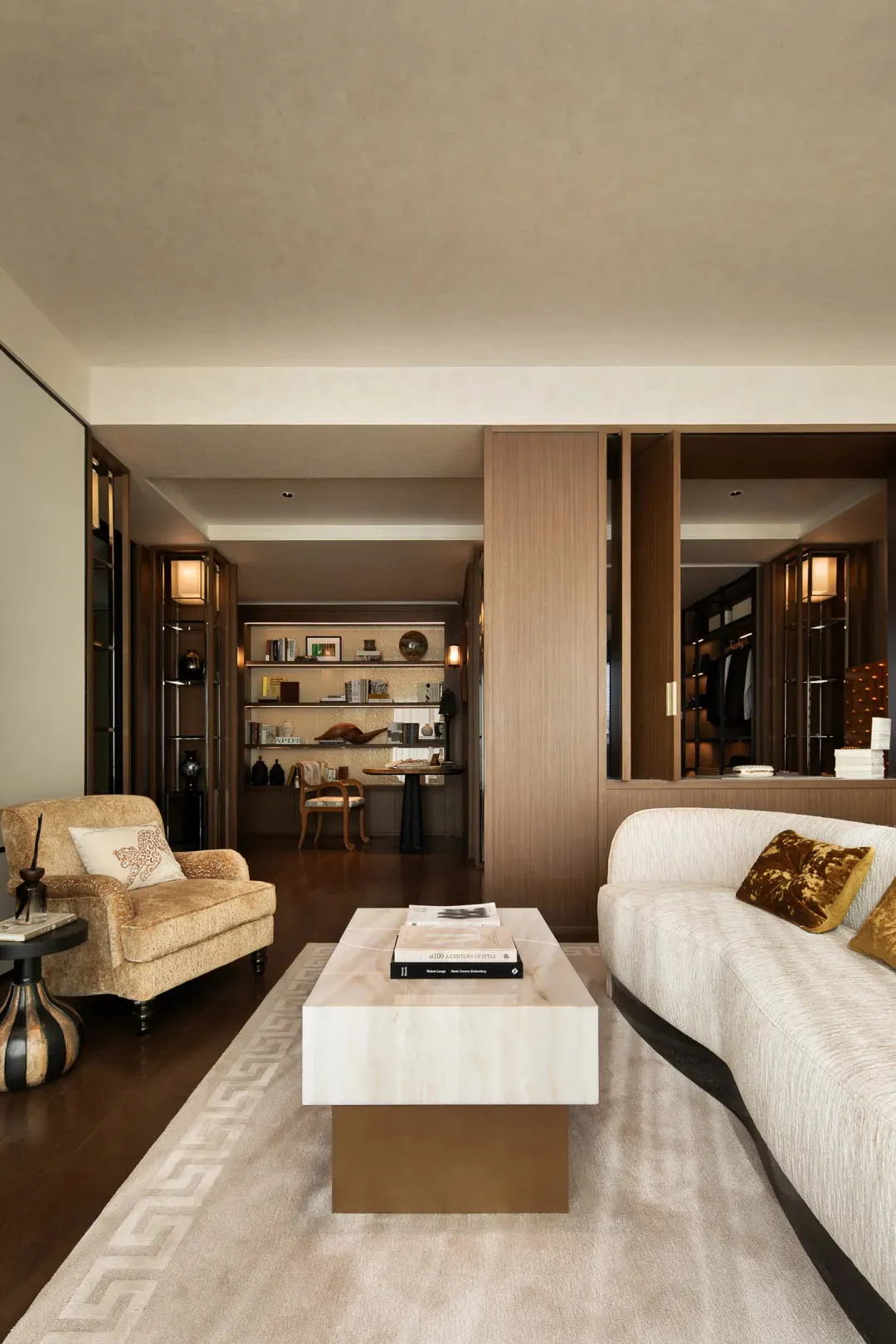 Warm and inviting living and dining space with wooden furniture, decorative items, and natural lighting