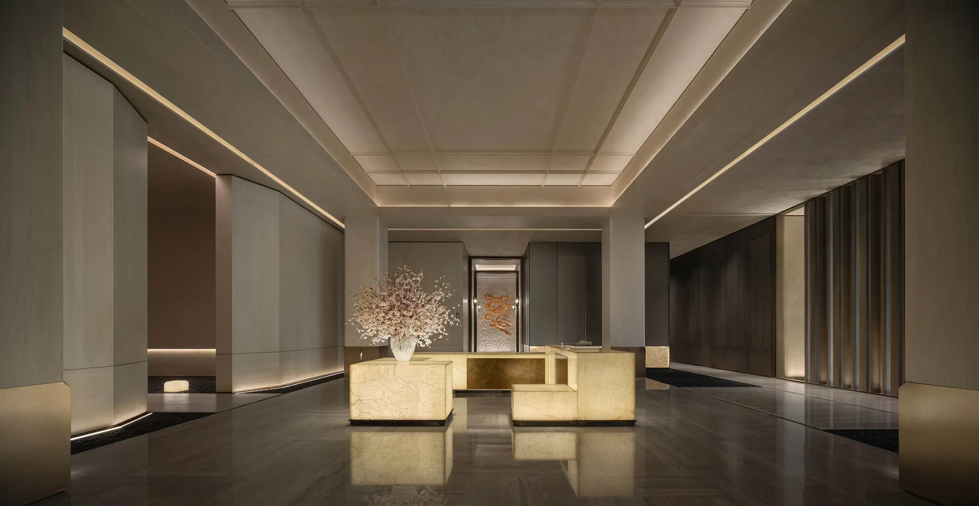 Well-lit modern room with a marble floor, a couch, chair, and dining table, featuring a vase with flowers and clean lines and minimalistic design elements