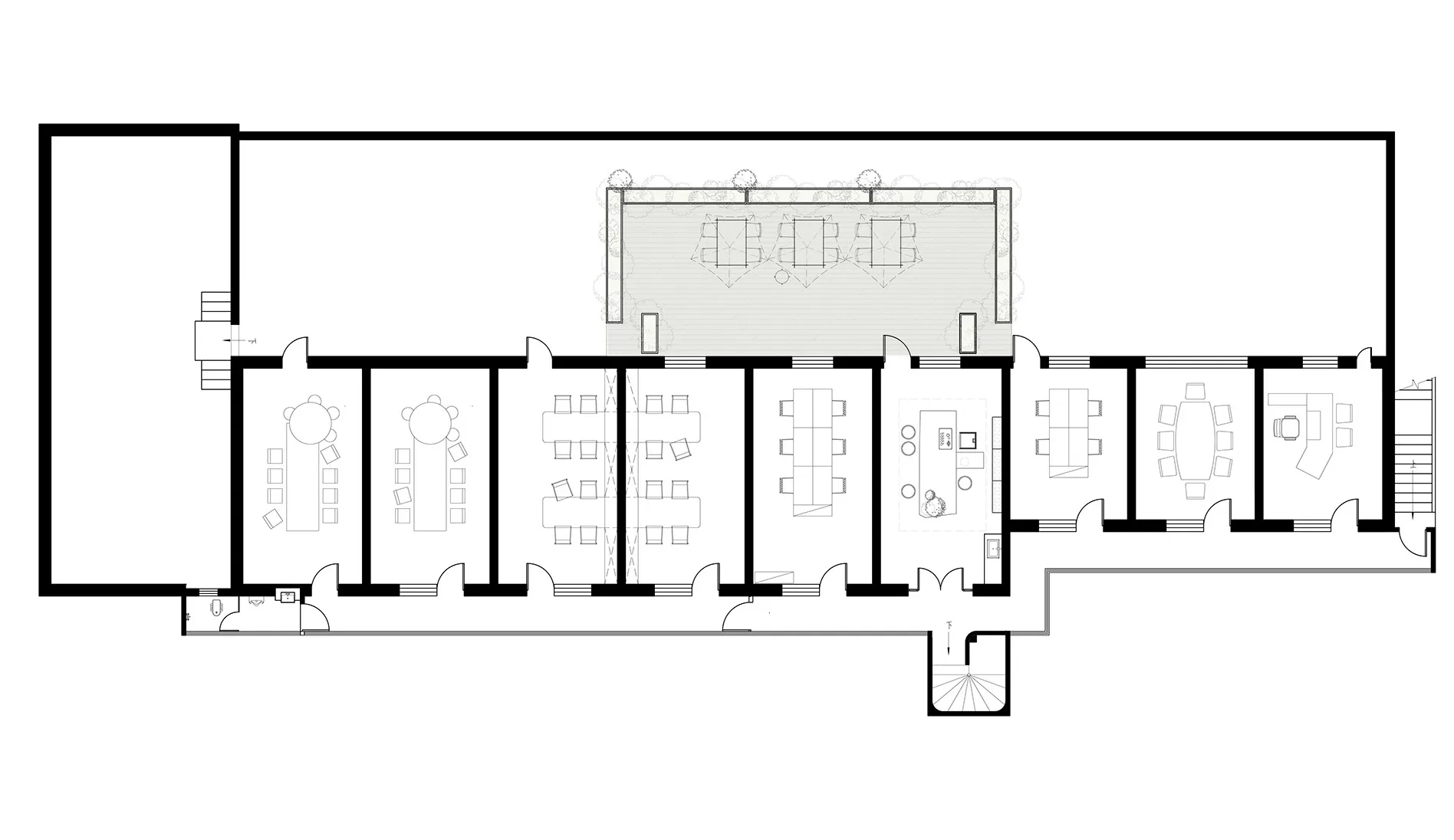 Black and white architectural floor plan of a long narrow restaurant featuring multiple dining rooms, a large outdoor terrace with trees, kitchen, and restrooms.
