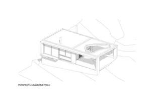 A modern house with glass walls and concrete structure.