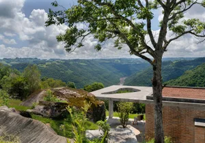 Landscape garden with stone pathway and modern concrete structures