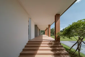Modern exterior walkway made of concrete.