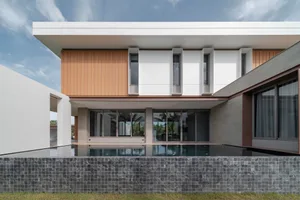 Modern residential home featuring concrete ledges on the exterior facade.