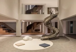 A modern playroom featuring a metal slide