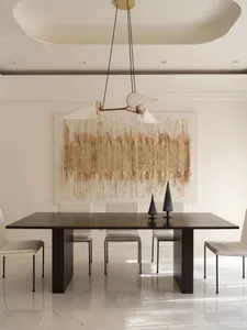 A modern dining room with a dark wooden table, white chairs, and a minimalist white floor with geometric patterns. A unique t