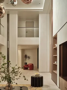 A stylish, modern interior design featuring a neutral color palette and minimalistic furniture.