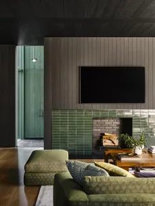 Modern living room featuring wooden tiles and concrete accents.