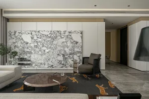 Modern living room featuring marble elements and contemporary furniture