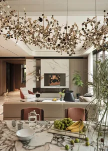 Luminous living room adorned with a modern chandelier, rustic wooden accents, intricate marble finishes, plush beige sofas, a
