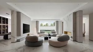 Modern style living room featuring elegant marble floors and furniture.