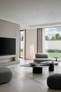 Contemporary minimalist living room featuring marble flooring, fabric ottomans, and a floor-to-ceiling window showcasing natu