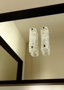 Modern interior design featuring glass ceiling lighting