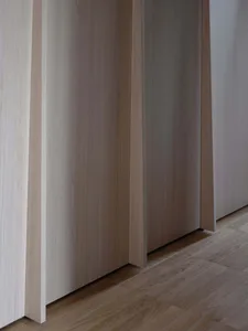 Light-wood paneled walls in a modern interior setting