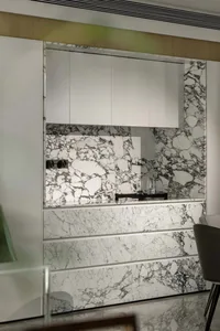 Modern kitchen with marble walls and countertop