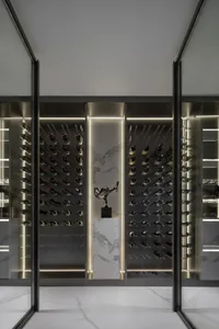 Modern wine cellar with marble and metal details