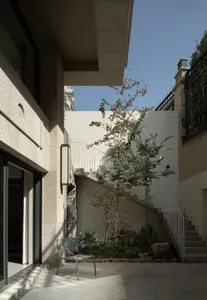Modern interior design featuring concrete walls and minimalist aesthetic in a residential home.