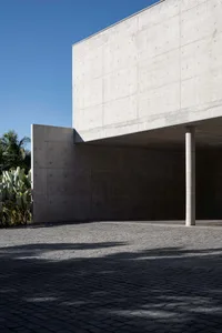 Modern architecture featuring concrete walls and columns.