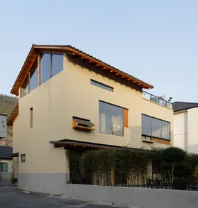 Modern residential house with concrete and glass exterior materials