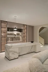 Modern interior design featuring a luxurious marble living room bar area.