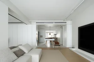 Modern minimalist living room with concrete and glass materials