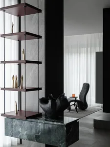 Modern living room featuring marble furniture, glass shelves, and metal accents.