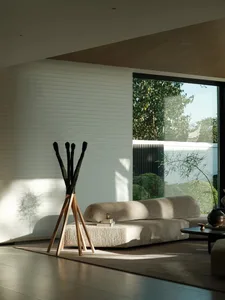 Modern minimalist living room with wooden furniture and large windows.