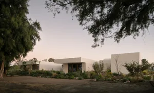 Modern residential exterior with concrete and steel elements