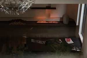 A modern living room featuring wooden flooring and glass fireplace.